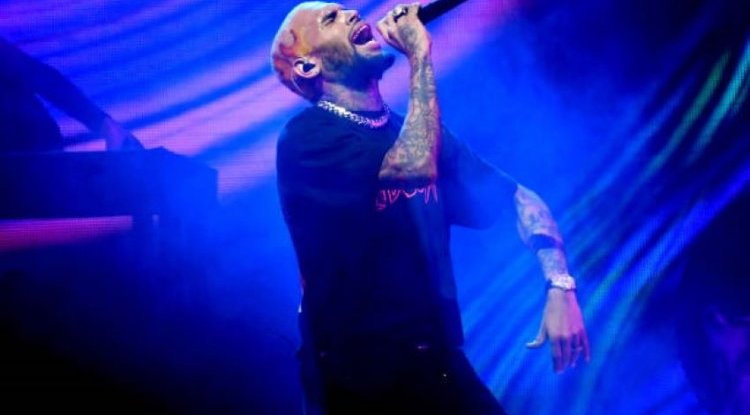 Chris Brown is under investigation for allegations that he hit a woman after he beat up Rihanna in 2009!