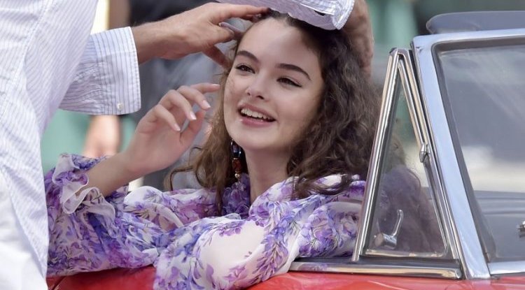 She is only 16 years old, but she is already used to posing seductively!