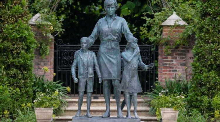 WHAT EXACTLY IS DIANA'S NEW STATUE: Children the princess hugs are not her grandchildren!