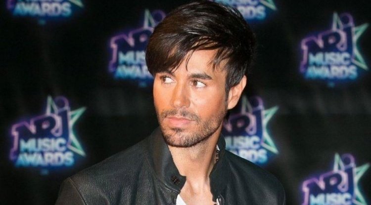 Enrique Iglesias touched everyone with his latest post, but someone didn't really like fooling around in the pool!