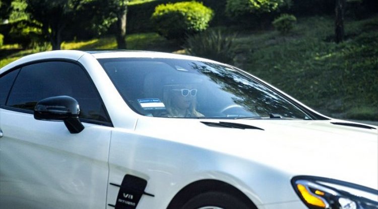 Britney spotted driving after she was released from custody - she received a call that made her cry