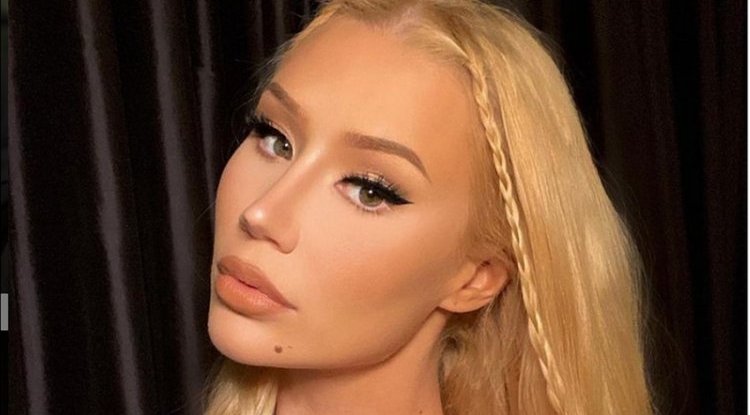 Although Iggy Azalea fiercely denies having bum implants, the latest photos could be proof that she isn't telling the truth