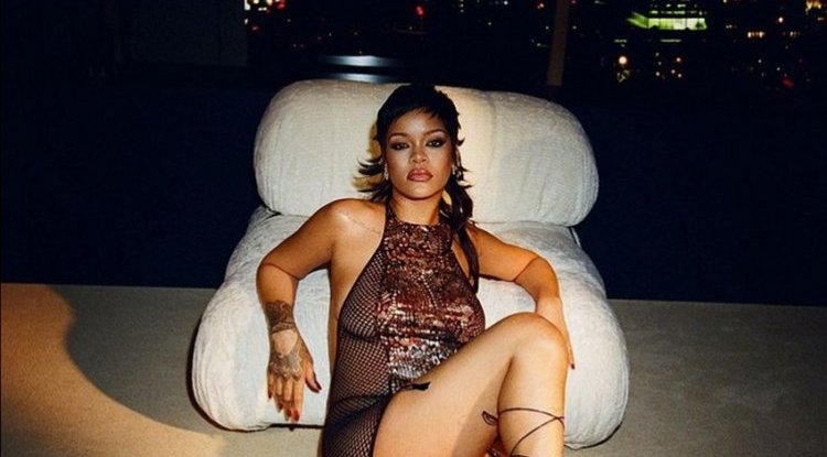 'Y’all ain’t ready': Rihanna promotes her Fenty show in a sexy fishnet mini dress