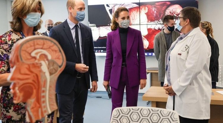 Fearless Kate bravely stroked the tarantula while William played with the python (VIDEO)