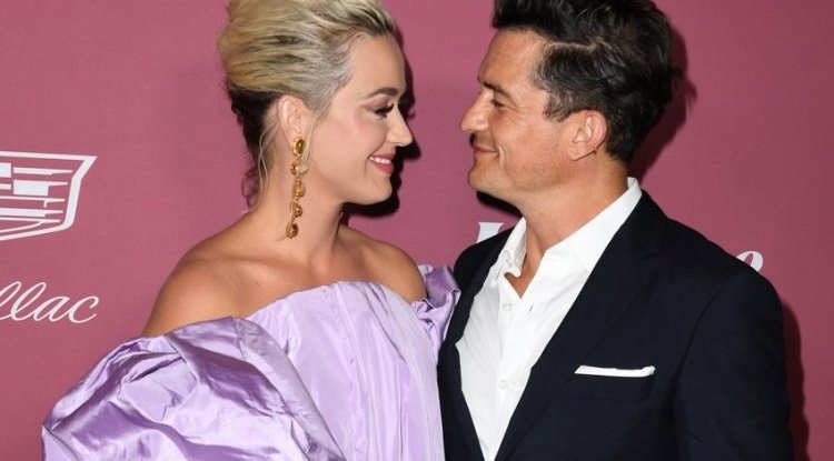With a huge unusual dress, Katy Perry overshadowed the competition, and the famous fiancé posed proudly with her