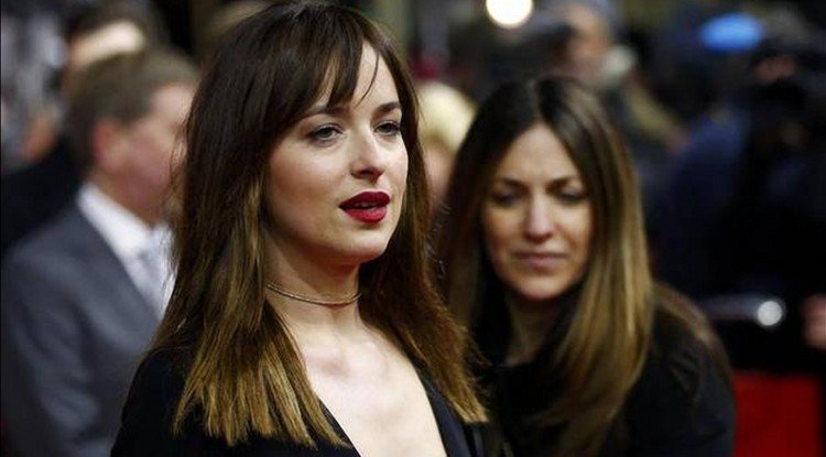 Dakota Johnson: 'Next to me lives a celebrity who doesn't invite me to his many parties'