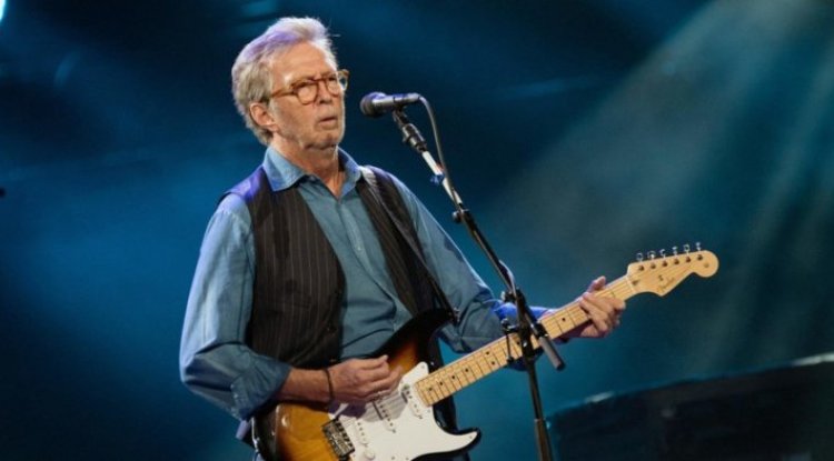 Eric Clapton is funding an anti-vaccine band, their songs about the vaccine are quite explicit