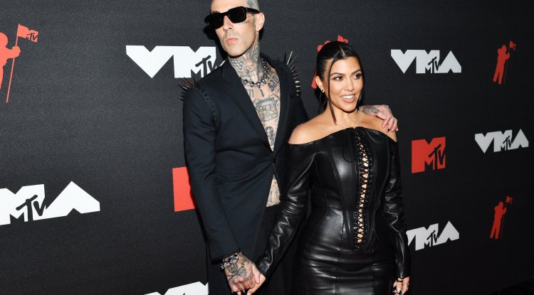 Kourtney Kardashian and her fiancé Travis Barker couldn't help themselves!