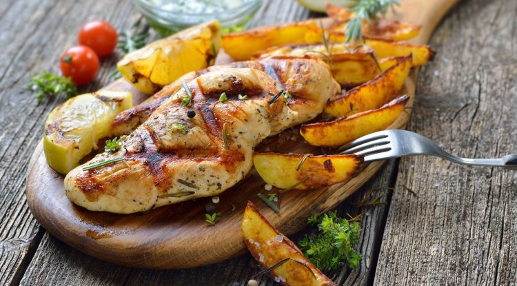 Aromatic roasted chicken breast with potatoes