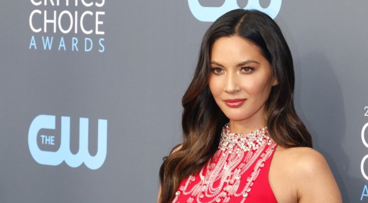 Olivia Munn and John Mulaney show off baby