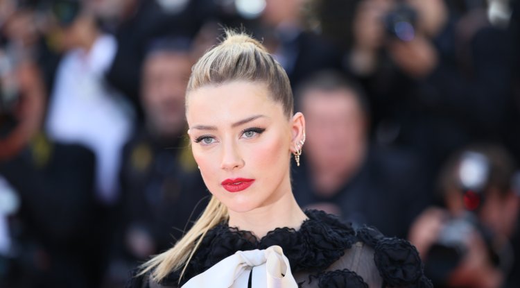 What if Amber doesn't pay compensation to Johnny?