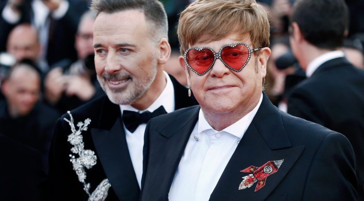 Elton John With His Partner In A Swiss Resort!