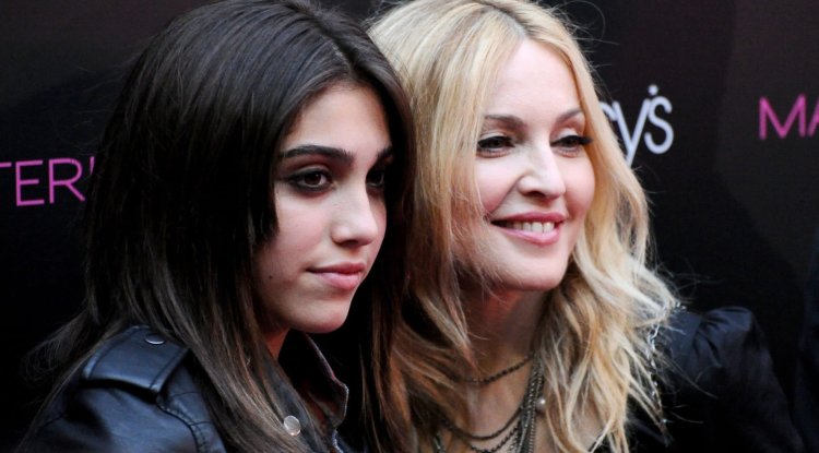 Lourdes Leon in a mini purple skirt
