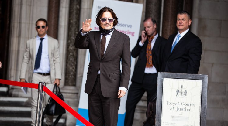 Where was Johnny at the time of reading the verdict?