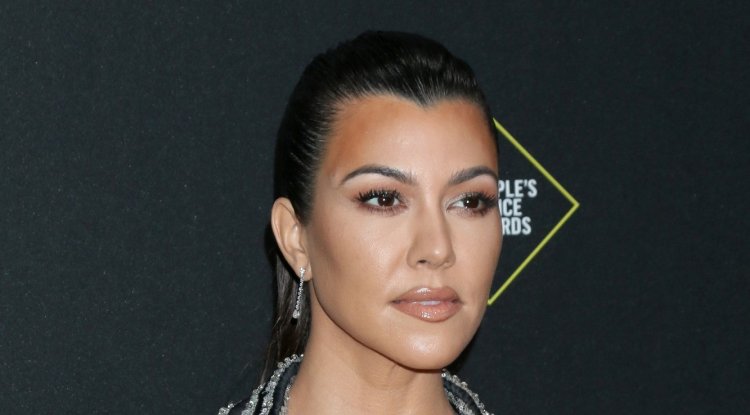 Kourtney and Travis caught on vacation in Italy