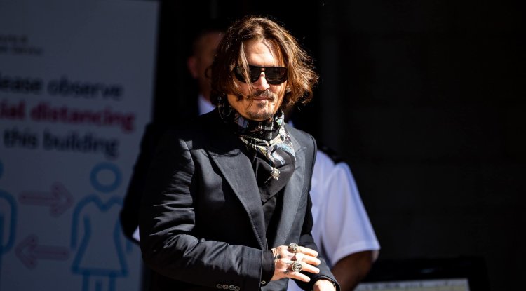 Johnny got close with his beautiful lawyer