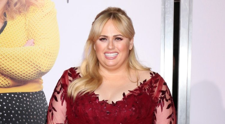 Was Rebel Wilson blackmailed into coming out?
