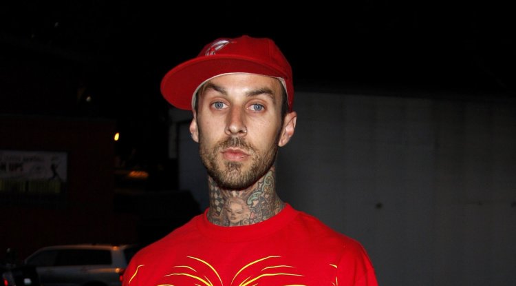Why Travis was urgently hospitalized?