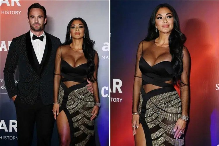 Nobody even noticed her handsome boyfriend: Nicole Scherzinger made sure that everyone was looking at her in a translucent dress