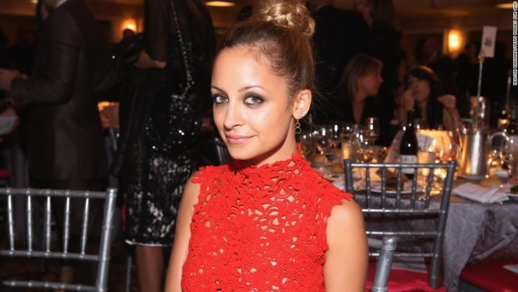 The moment of inattention was almost fatal: Candles on a birthday cake set Nicole Richie's hair on fire