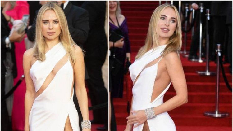 Fashion designer Kimberley Garner 'stole' the show at the premiere, everyone is wondering if she is wearing anything under the dress