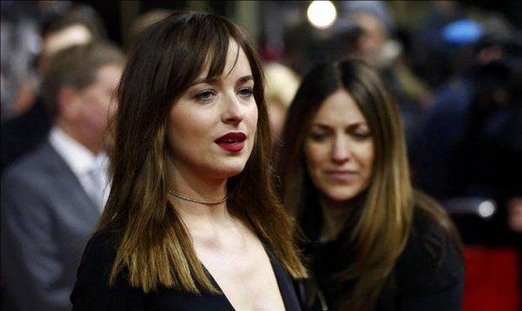 Dakota Johnson: 'Next to me lives a celebrity who doesn't invite me to his many parties'