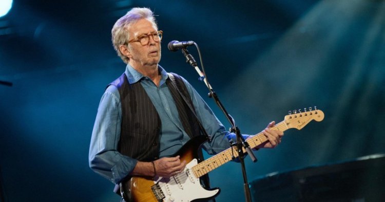 Eric Clapton is funding an anti-vaccine band, their songs about the vaccine are quite explicit
