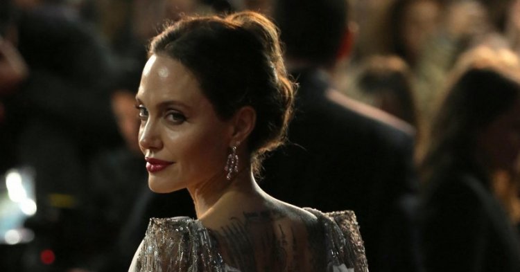 A close source revealed juicy details about Angelina after Brad's divorce: 'Make up for lost time!'