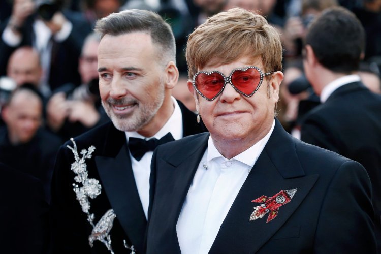 Elton John With His Partner In A Swiss Resort!