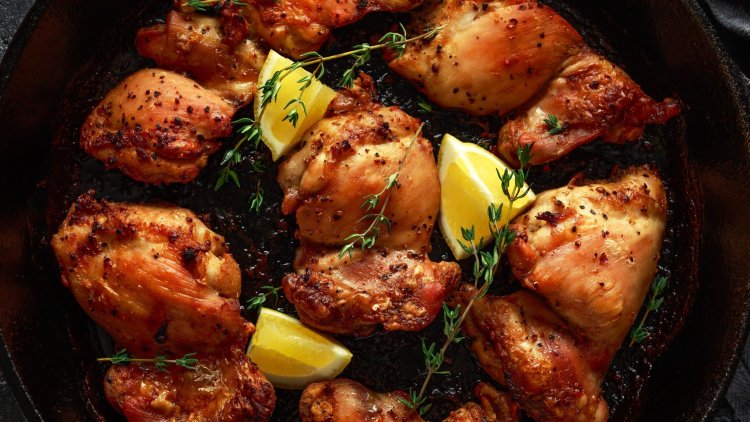 Delicious chicken thighs with lemon and thyme