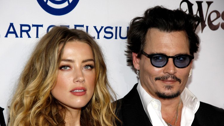 Did Amber Heard blackmail Johnny Depp?