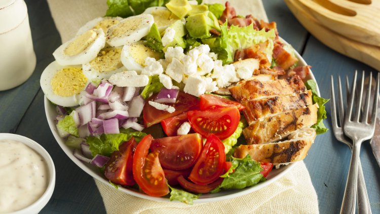 Summer salad with chicken and boiled eggs