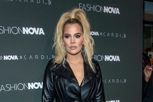 Khloe in a tight latex dress!
