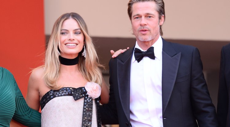 Margot Robbie explained how she came to kiss Brad Pitt